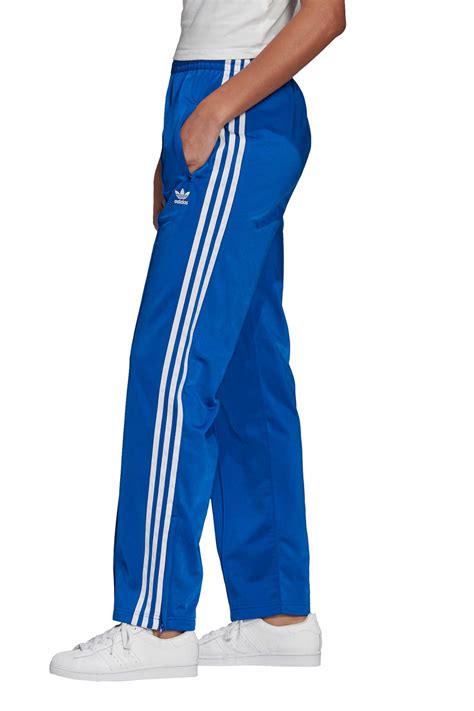 adidas blauw met rode streep traininfsbroek dames|Adidas broek dames.